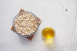 peanuts and oils in a container photo