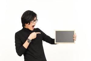 Showing, Presenting and holding Blank Blackboard Of Handsome Asian Man Isolated On White Background photo