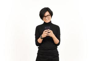 Holding and Using Smartphone with Smiling Face Of Handsome Asian Man Isolated On White Background photo