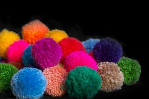 texturizado antecedentes de clasificado y multicolor lana pom pompones foto