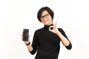 Showing Apps or Ads On Blank Screen Smartphone Of Handsome Asian Man Isolated On White Background photo