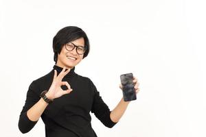 Showing Apps or Ads On Blank Screen Smartphone Of Handsome Asian Man Isolated On White Background photo