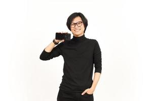 Showing Apps or Ads On Blank Screen Smartphone Of Handsome Asian Man Isolated On White Background photo