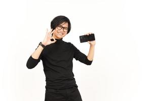 Showing Apps or Ads On Blank Screen Smartphone Of Handsome Asian Man Isolated On White Background photo