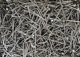 A pile of nails, steel in a box, for making the background photo