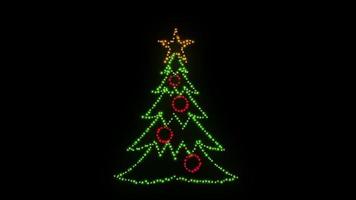 Lighting and flares bulb on the Christmas tree icon loop Animation video transparent background with alpha channel
