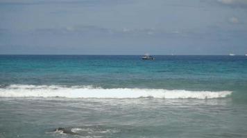 Turquoise waves rolled on the beach of Koh Miang island, Similan Islands, slow motion video