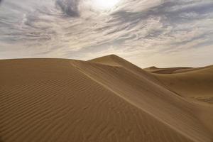 summer desert landscape on a warm sunny day from Maspalomas dunes on the Spanish island of Gran Canaria photo