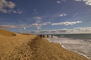 summer desert landscape on a warm sunny day from Maspalomas dunes on the Spanish island of Gran Canaria photo