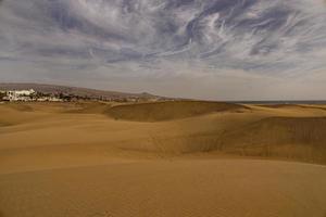 summer desert landscape on a warm sunny day from Maspalomas dunes on the Spanish island of Gran Canaria photo