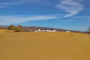 summer desert landscape on a warm sunny day from Maspalomas dunes on the Spanish island of Gran Canaria photo