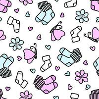 Hand drawn seamless pattern with socks for newborns in doodle style. Vector illustration.