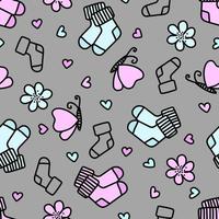 Hand drawn seamless pattern with socks for newborns in doodle style. Vector illustration.