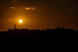 vistoso puesta de sol en el Español isla de gran canaria en el maspalomas dunas foto