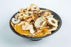 Dried fruits isolated on white background. Healthy eating concept. Top view. Healthy vegetarian food concept. Dried fruit chips. photo