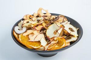 Dried fruits isolated on white background. Healthy eating concept. Top view. Healthy vegetarian food concept. Dried fruit chips. photo