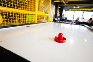 Air hockey at kids play center. photo