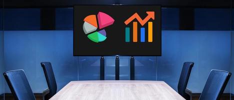 Television with diagram and chart on display in meeting room photo