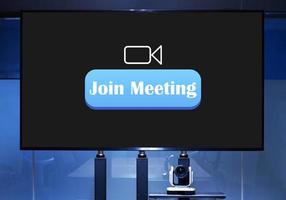 Television with blue button message Join Meeting and white icon video camera on display in meeting room photo