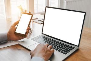 Mockup image of close up business woman working with smartphone laptop and documents in office, mockup concept photo