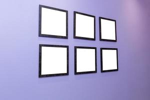 Four black frames on a purple wall with a white background. photo