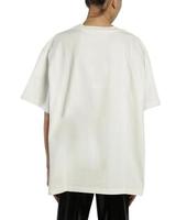 A woman wears a white over size t shirt photo