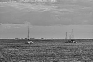 oceanic calm landscape on the Spanish island of Fuerteventura with boats photo