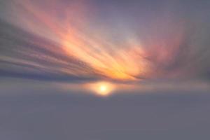 Real amazing panoramic sunrise or sunset sky with gentle colorful clouds. Long panorama, crop it photo
