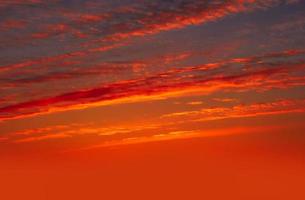 Real amazing panoramic sunrise or sunset sky with gentle colorful clouds. Long panorama, crop it photo