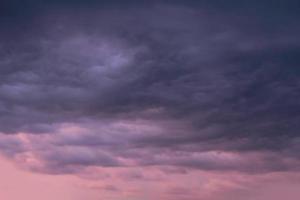 Real amazing panoramic sunrise or sunset sky with gentle colorful clouds. Long panorama, crop it photo