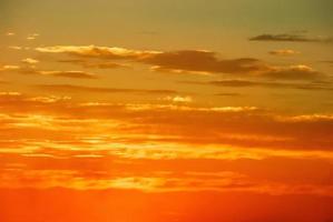 Real amazing panoramic sunrise or sunset sky with gentle colorful clouds. Long panorama, crop it photo