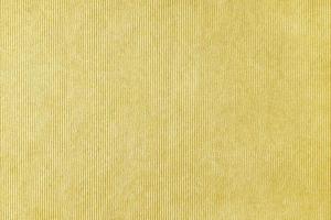 Yellow velveteen upholstery fabric texture background. photo