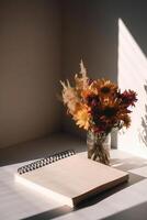 Blank notepad with dry flowers. Illustration photo