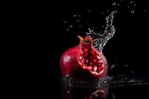 Pomegranate on black background. Generate Ai photo