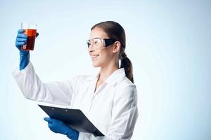 female laboratory assistant medicine research technology chemistry photo
