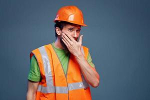 hombre en trabajando uniforme a profesionales construcción estilo de vida azul antecedentes foto