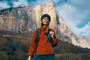 cheerful woman hiker nature landscape rocky mountains travel photo