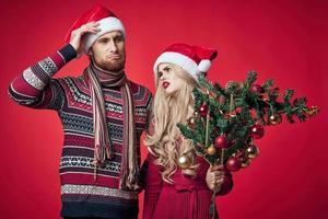 man and woman holiday christmas decoration emotions photo