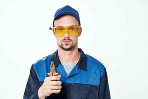 man in construction uniform pliers repair construction professionals photo