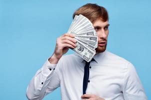 business man in shirt with tie bundle of money finance photo