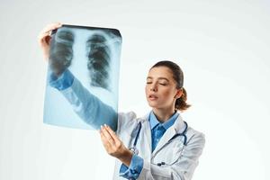 female doctor in white coat x-ray examination treatment photo