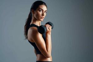 Delgado figura mujer deporte gimnasio rutina de ejercicio estilo de vida foto