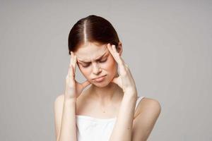 woman headache health problems stress isolated background photo