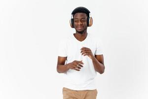african looking man wearing headphones music entertainment lifestyle photo
