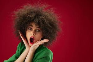 Beautiful fashionable girl grimace afro hairstyle red lips fashion color background unaltered photo