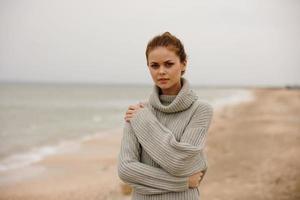 woman cloudy weather by the sea travel fresh air unaltered photo