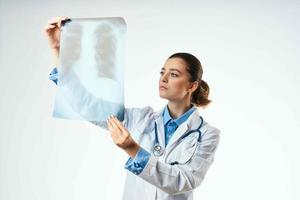 woman on nurse white coat x-ray hospital patient examination photo