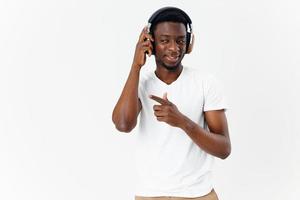 african man wearing headphones music entertainment wireless technology photo