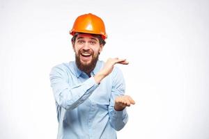 emocional trabajadores en naranja pintar la seguridad en construcción industria oficial foto