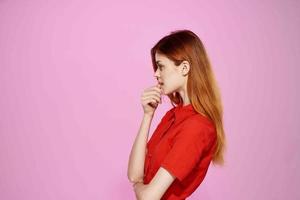 pretty woman in red dress fashion elegant style pink background photo